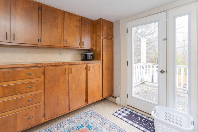 entryway featuring a baseboard radiator