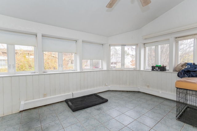 sunroom / solarium with ceiling fan, a healthy amount of sunlight, lofted ceiling, and baseboard heating