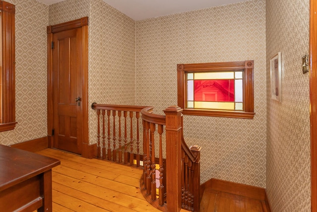 corridor featuring light hardwood / wood-style floors