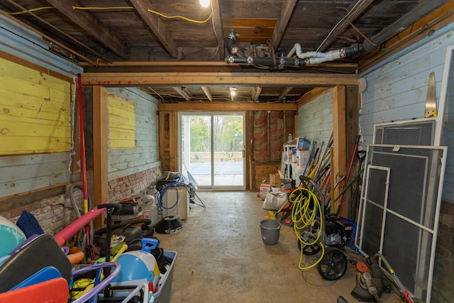 interior space featuring wood walls