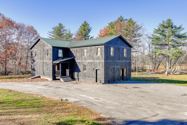 exterior space with a front yard