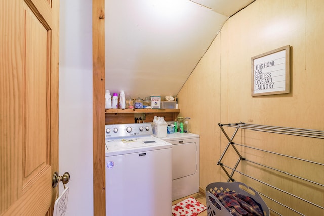 washroom with washer and dryer