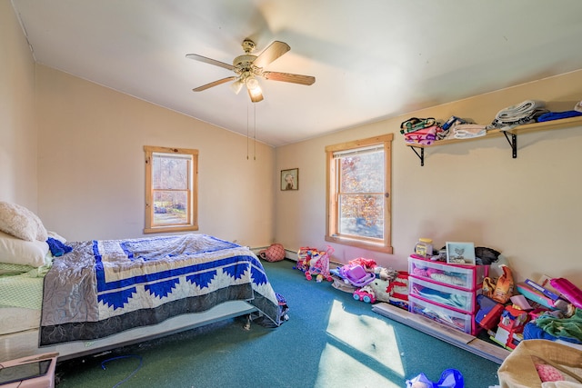 carpeted bedroom with ceiling fan and lofted ceiling