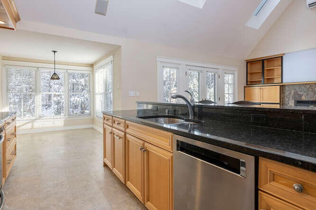 kitchen featuring pendant lighting, a healthy amount of sunlight, dishwasher, and sink