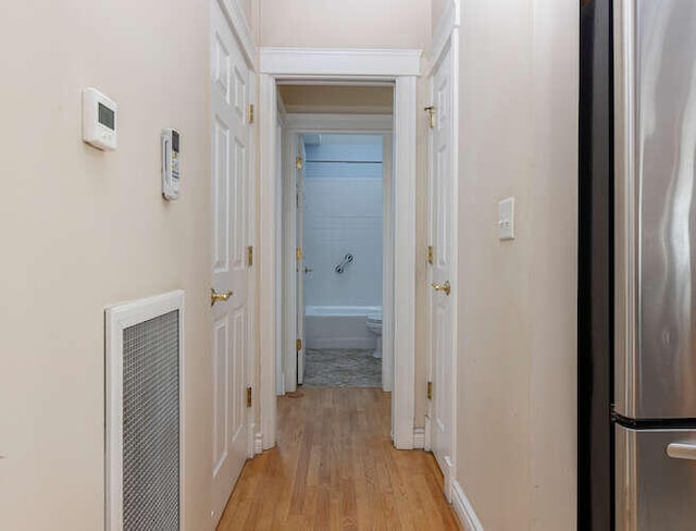 hall featuring light hardwood / wood-style flooring