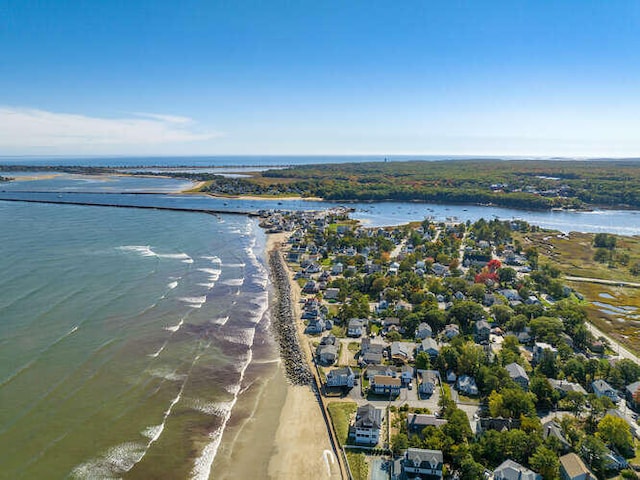 bird's eye view featuring a beach view and a water view