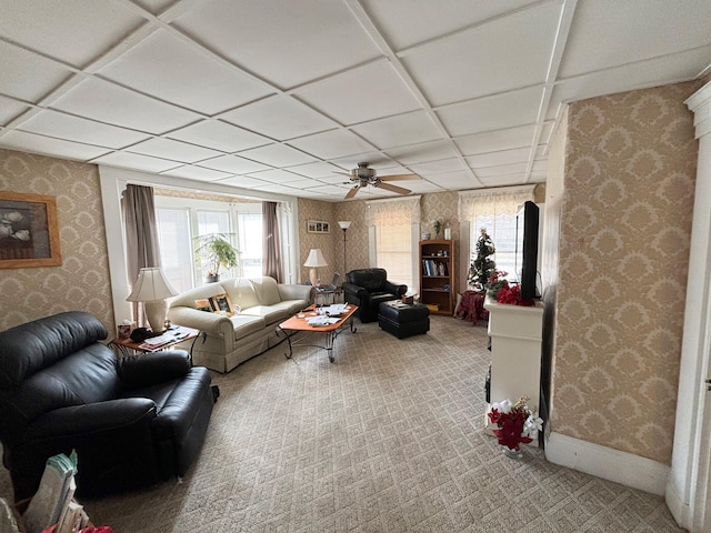 living room with carpet floors and ceiling fan