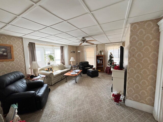 77 Fletcher St, Kennebunk, ME 04043 - living area with carpet, wallpapered walls, and a wealth of natural light