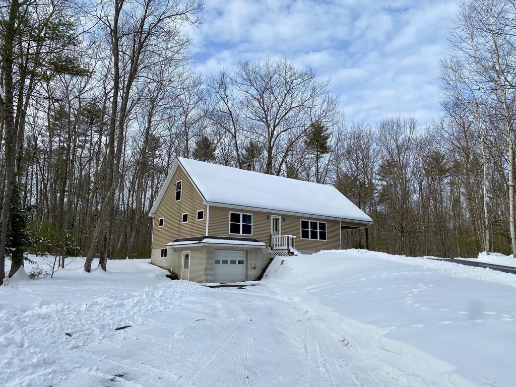 58 Old Standish Rd, Buxton, ME 04093 - view of front of property with a garage