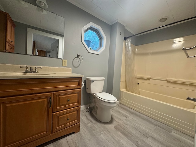 full bathroom featuring shower / bathtub combination with curtain, wood-type flooring, toilet, vanity, and crown molding