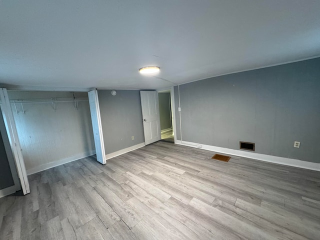 unfurnished bedroom with light hardwood / wood-style floors