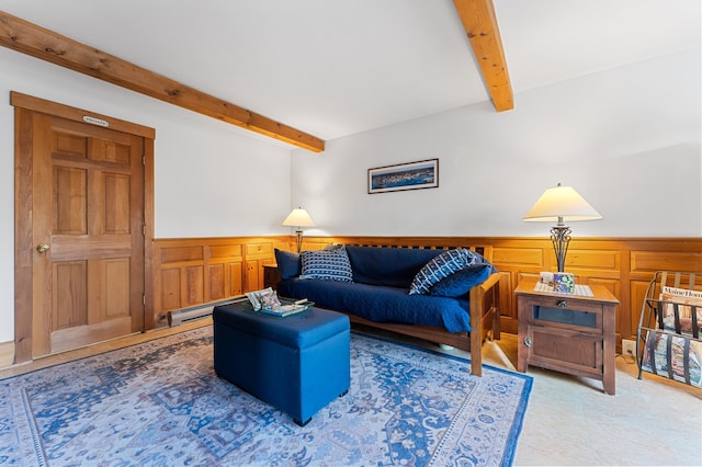 living room with beam ceiling and a baseboard radiator