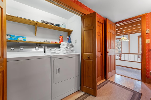 laundry area with separate washer and dryer