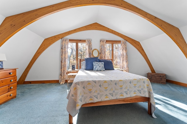 carpeted bedroom featuring lofted ceiling