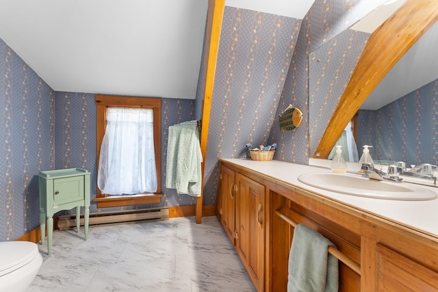 bathroom featuring vanity, a baseboard radiator, and toilet