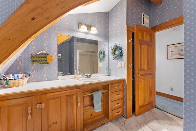 bathroom featuring vanity