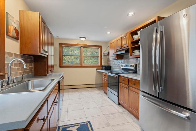 kitchen with sink, stainless steel appliances, a baseboard radiator, decorative backsplash, and light tile patterned floors