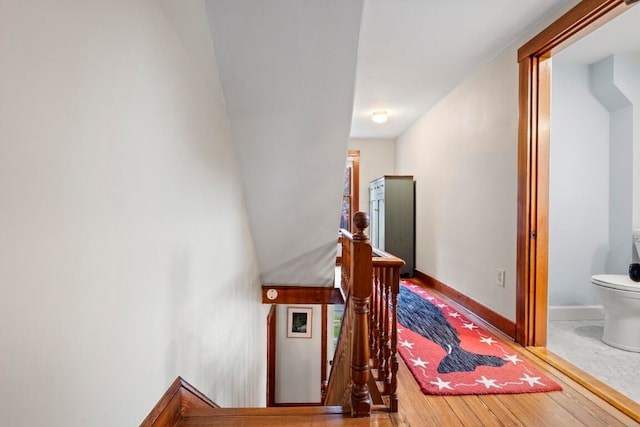 hallway featuring hardwood / wood-style flooring