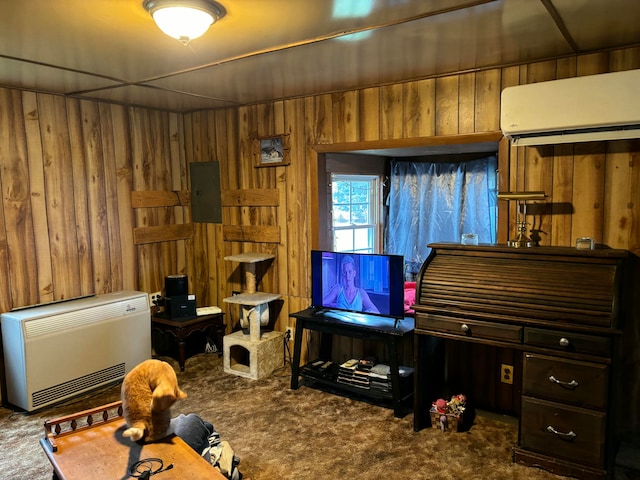 miscellaneous room featuring heating unit, wood walls, a wall mounted AC, and carpet flooring