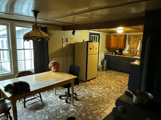 dining room featuring sink