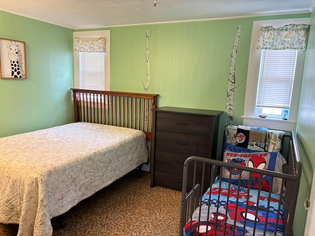 bedroom with crown molding