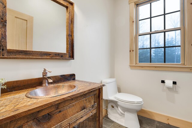 100 Morganite Way, Newry, ME 04261 - half bath featuring toilet, vanity, healthy amount of natural light, and baseboards