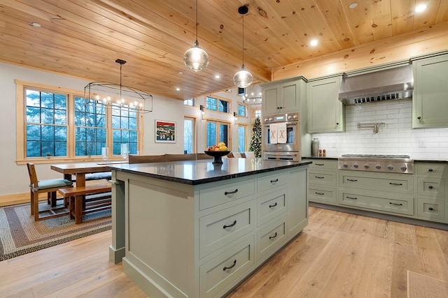 kitchen with range hood, decorative light fixtures, light hardwood / wood-style floors, and wooden ceiling