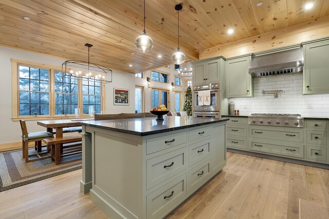 100 Morganite Way, Newry, ME 04261 - kitchen featuring appliances with stainless steel finishes, wooden ceiling, exhaust hood, decorative backsplash, and light wood-type flooring