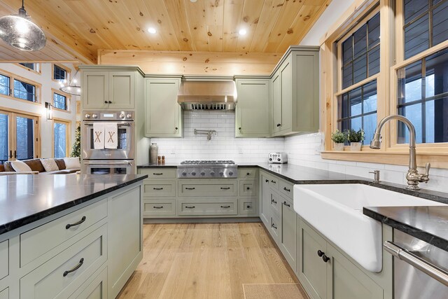 100 Morganite Way, Newry, ME 04261 - kitchen with wooden ceiling, stainless steel appliances, a sink, green cabinetry, and backsplash