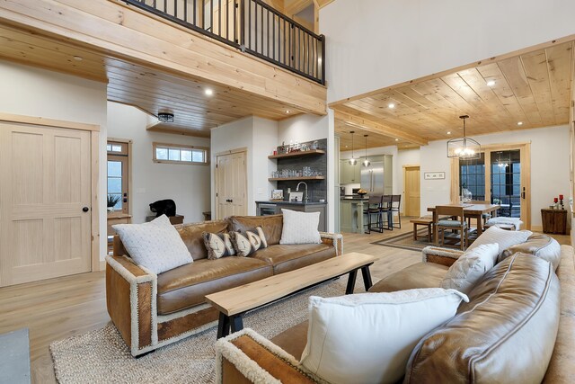 100 Morganite Way, Newry, ME 04261 - living room featuring wood ceiling, light wood finished floors, recessed lighting, and a chandelier