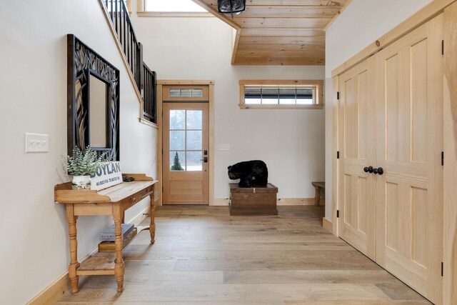 100 Morganite Way, Newry, ME 04261 - foyer entrance featuring light wood-style floors, wood ceiling, and baseboards