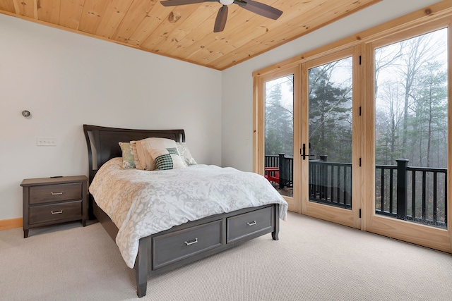 carpeted bedroom with wood ceiling, access to outside, and ceiling fan