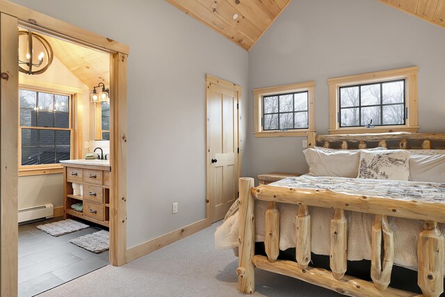 100 Morganite Way, Newry, ME 04261 - bedroom featuring a baseboard heating unit, vaulted ceiling, wood ceiling, and baseboards