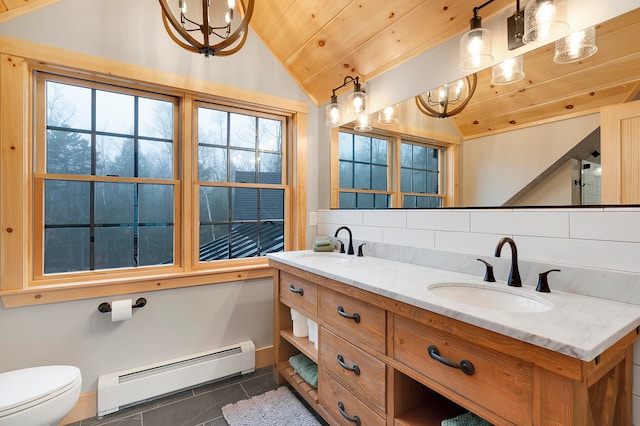 bathroom with lofted ceiling, wooden ceiling, toilet, vanity, and baseboard heating