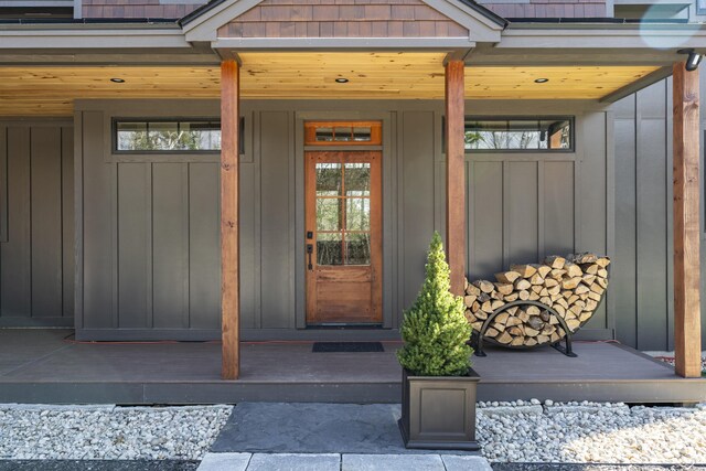 100 Morganite Way, Newry, ME 04261 - property entrance with covered porch and board and batten siding