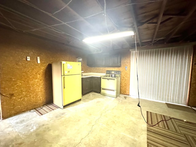 basement with white refrigerator