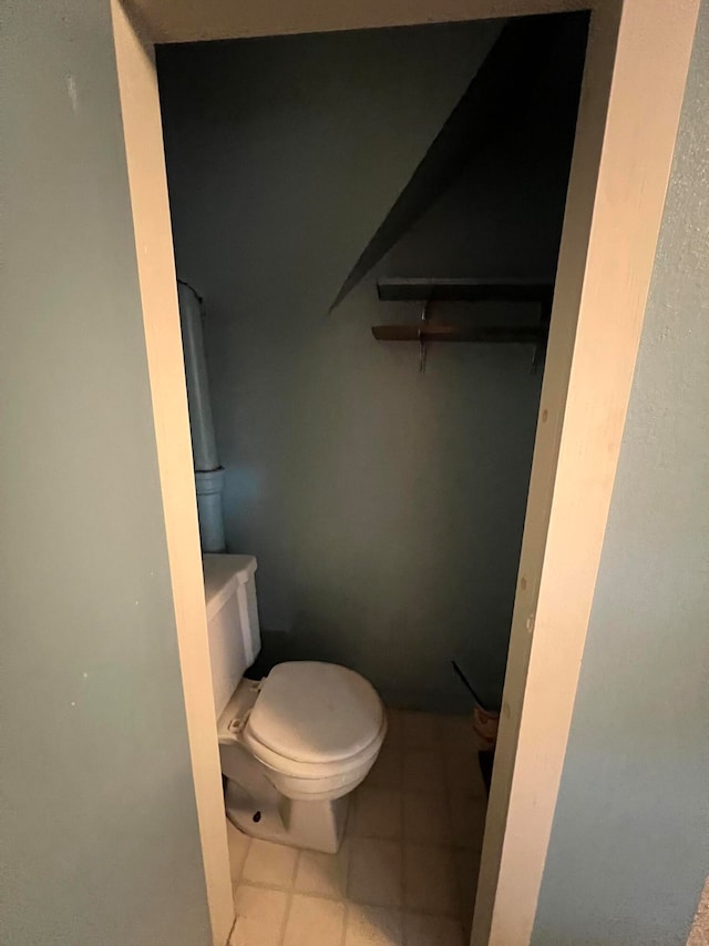 752 Caribou Rd, Fort Kent, ME 04743 - bathroom with toilet and tile patterned floors