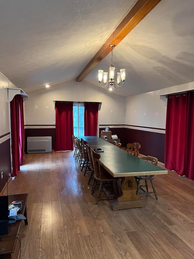 752 Caribou Rd, Fort Kent, ME 04743 - dining room featuring a wall mounted air conditioner, an inviting chandelier, dark hardwood / wood-style floors, and lofted ceiling with beams