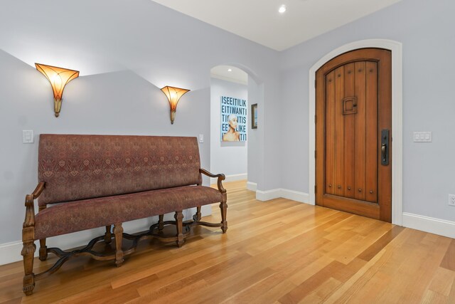 107 Lindsay Rd, York, ME 03909 - foyer with light wood-style floors, arched walkways, baseboards, and recessed lighting