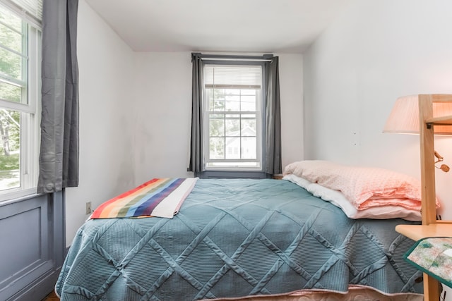 bedroom featuring multiple windows