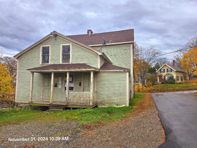 view of property with covered porch