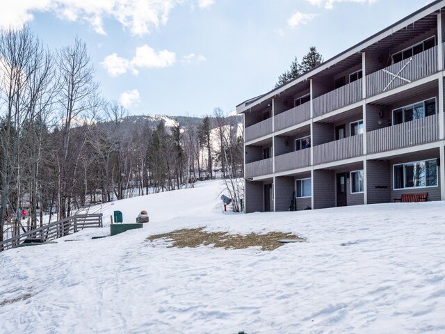 view of snow covered property