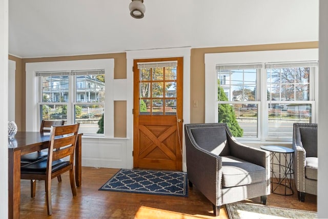 doorway featuring plenty of natural light and hardwood / wood-style flooring