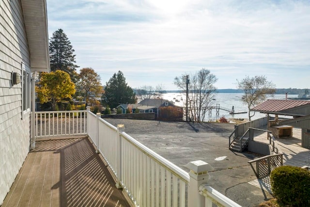 balcony with a deck with water view