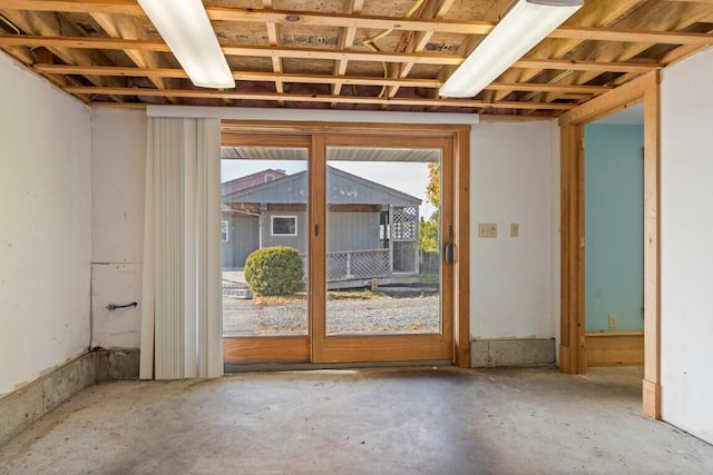 miscellaneous room with concrete flooring