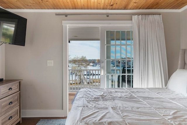 bedroom with a water view, wood ceiling, ornamental molding, and wood-type flooring