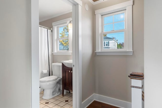 bathroom with tile patterned floors, toilet, a shower with curtain, ornamental molding, and vanity