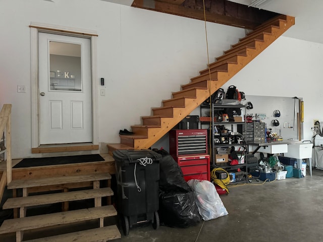 interior space with concrete floors and a workshop area