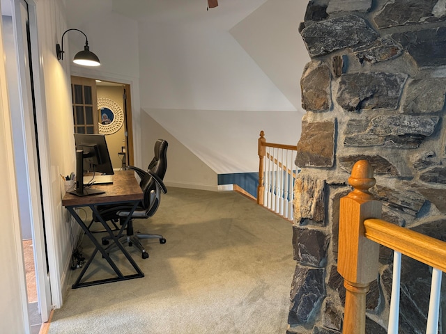 home office featuring lofted ceiling, carpet floors, and ceiling fan