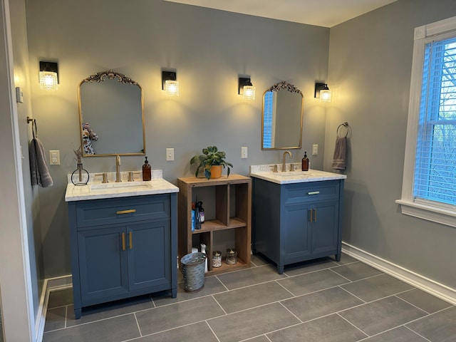 bathroom with vanity and tile patterned flooring